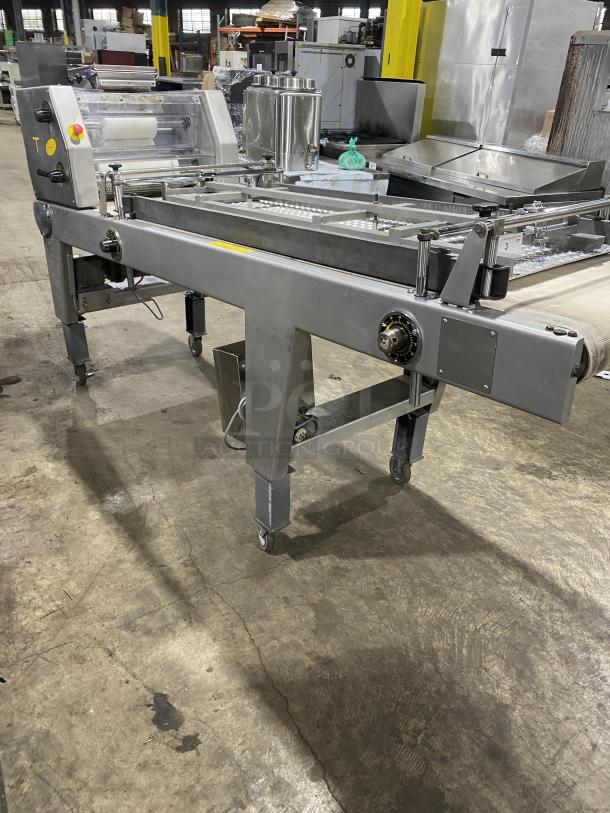 BTF Commercial Dough Moulder Machine, Stainless Steel, Model: OBLIK 3000, SN: 001, on casters, 3N 208V, excellent condition.