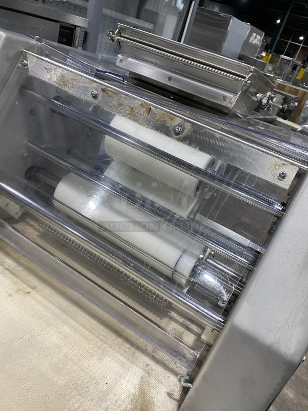 BTF Commercial Stainless Steel Dough Moulder, Model OBLIK 3000, on casters, 3N 208V, serial number 001, used condition.