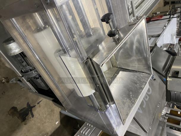 BTF Commercial Stainless Steel Dough Moulder, Model OBLIK 3000 SN: 001. Equipped with casters, 3N 208V, in good condition.