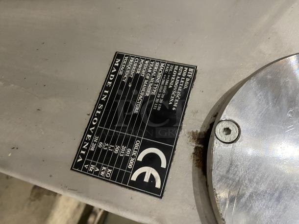 BTF Stainless Steel Dough Moulder Machine, Model OBLIK 3000, Serial 001, on casters, 3N 208V, "Made in Slovenia" label visible.