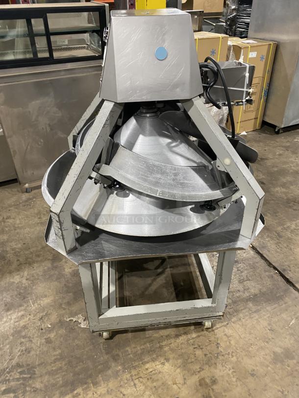 Benier stainless steel conical dough rounder machine on casters, used condition, ideal for commercial bakeries.