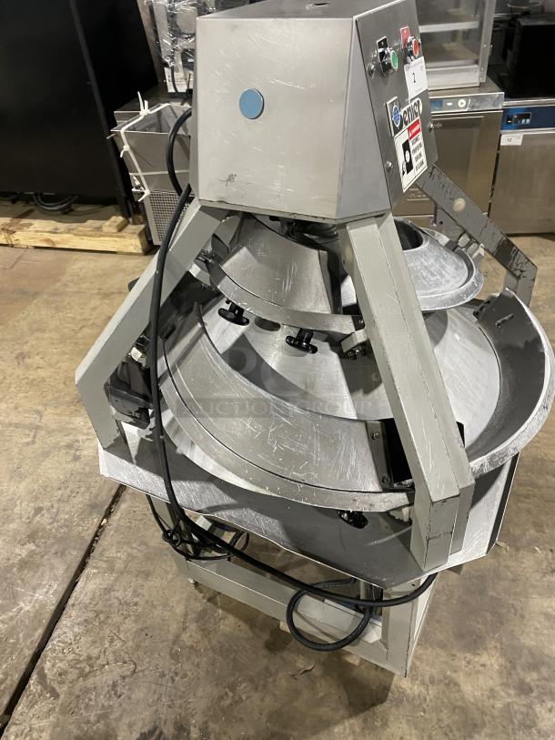 Benier commercial stainless steel conical dough rounder machine on casters, with control panel and industrial-grade design.