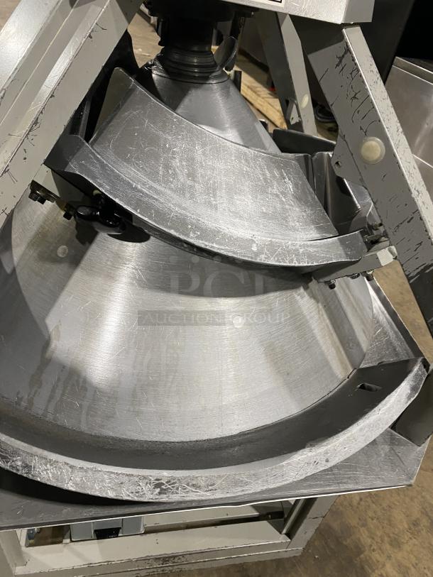 Benier stainless steel conical dough rounder machine on casters, showing interior mechanism. Slight surface wear visible.