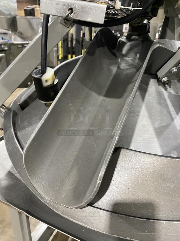 Benier commercial stainless steel conical dough rounder machine with casters, shown in excellent condition.