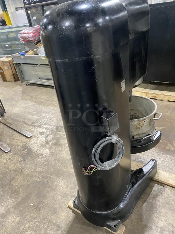 Hobart M802 stainless steel commercial mixer, model 1317020. Black exterior, shows wear, wires exposed, missing cover.