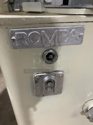 Rompa commercial electric dough rounder/divider with rounding plate, white, free-standing. Branded "ROMPA" plate visible.