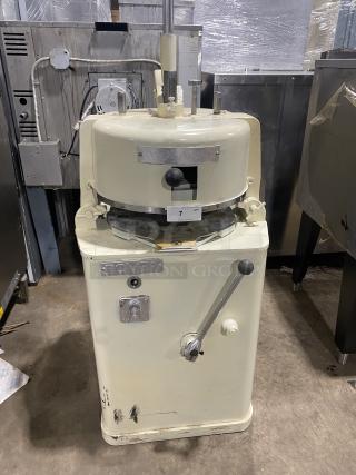Rompa white electric dough rounder/divider, free-standing, with rounding plate. Good condition, Rompa branding visible.