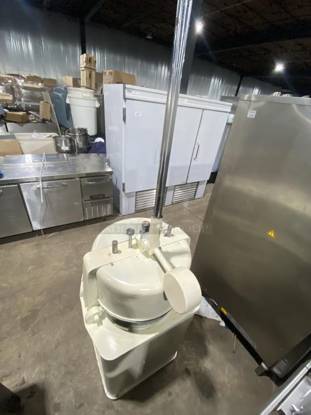 Rompa white electric dough rounder/divider, free-standing, with rounding plate. Shows industrial condition.