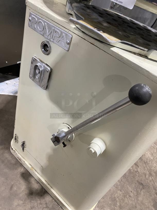 Rompa commercial white electric dough rounder/divider with rounding plate. Features handle and visible branding label. Working condition.