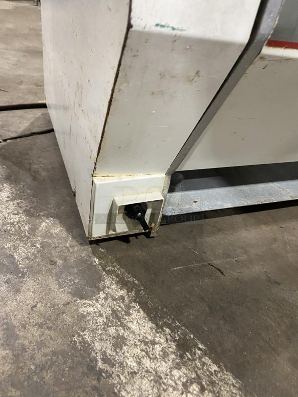 Merand Tenor 2 Commercial Electric Dough Moulder, white, countertop model, visible wear, used condition.