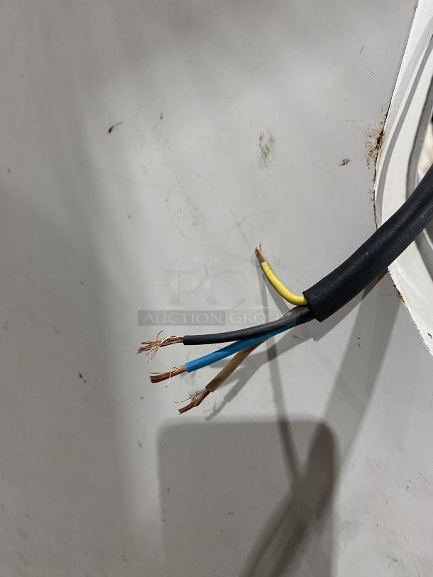 Merand Tenor 2 dough moulder with exposed wiring, showing wear. White finish, commercial electric countertop model.