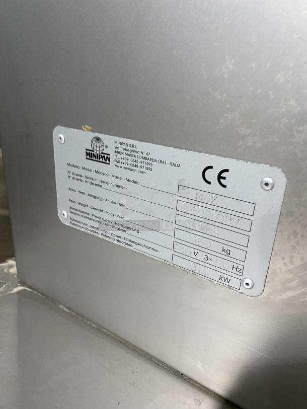 Minipan MOX stainless steel electric dough sheeter, model MOX, SN 2005087, 220V, 3 phase, with conveyor and casters.