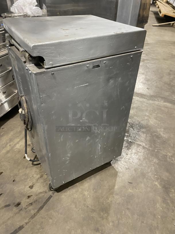 Panimatic Commercial Electric Dough Divider, free-standing on casters, metallic finish, used condition.