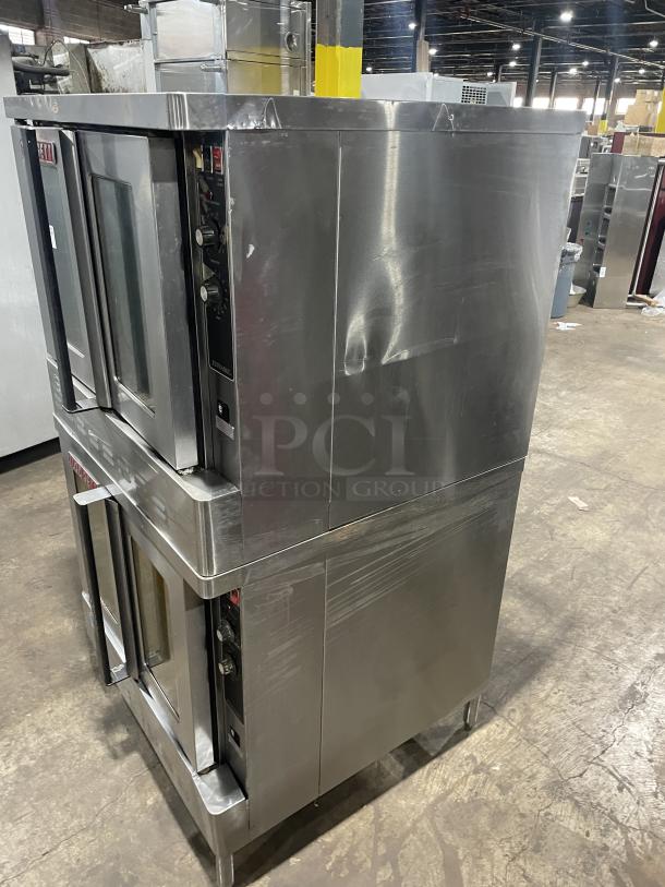 Blodgett stainless steel gas-powered double-stacked convection oven with digital controls and wired oven rack, on legs.