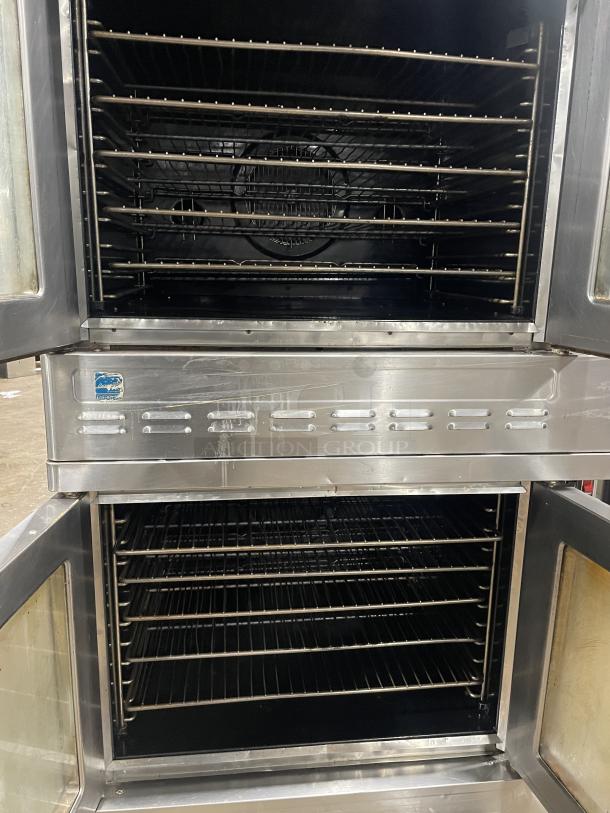 Blodgett gas-powered double-stacked convection oven with digital controls and wired racks, stainless steel, on legs.