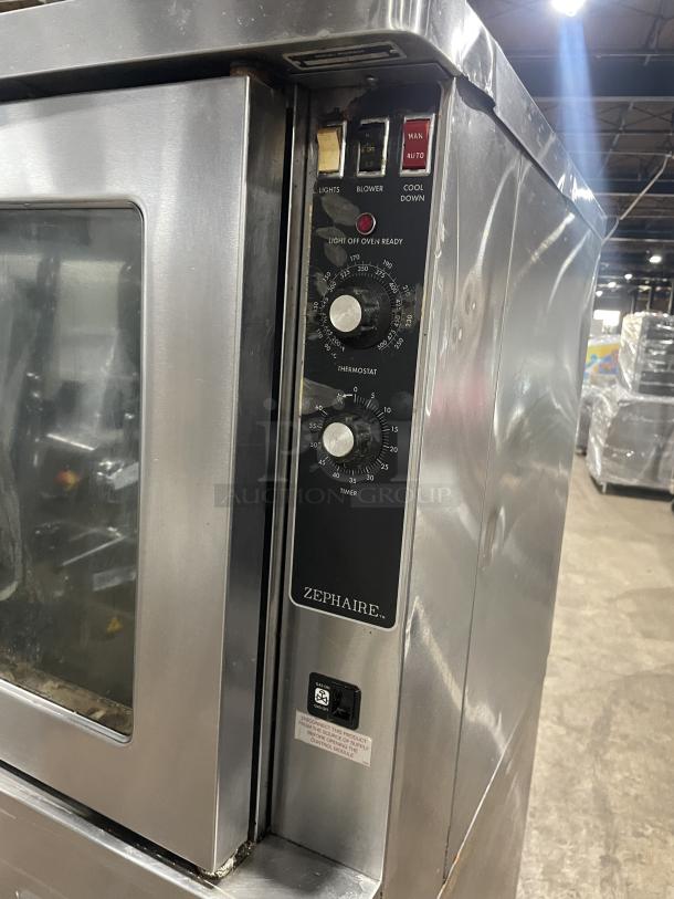 Blodgett stainless steel gas double-stacked convection oven with digital controls, wired rack, on legs, good condition.