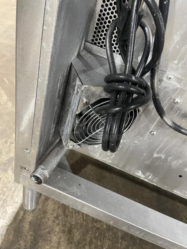 Blodgett commercial stainless steel double convection oven, gas-powered, digital controls, wired rack, on legs.