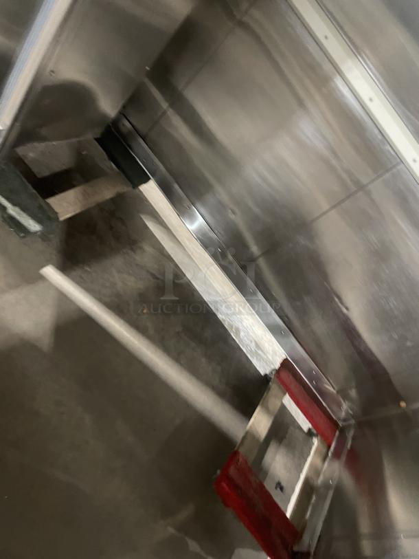 Alt text: "Interior of Hobart stainless steel heated holding/proofing cabinet with metallic finish, digital controls not visible."