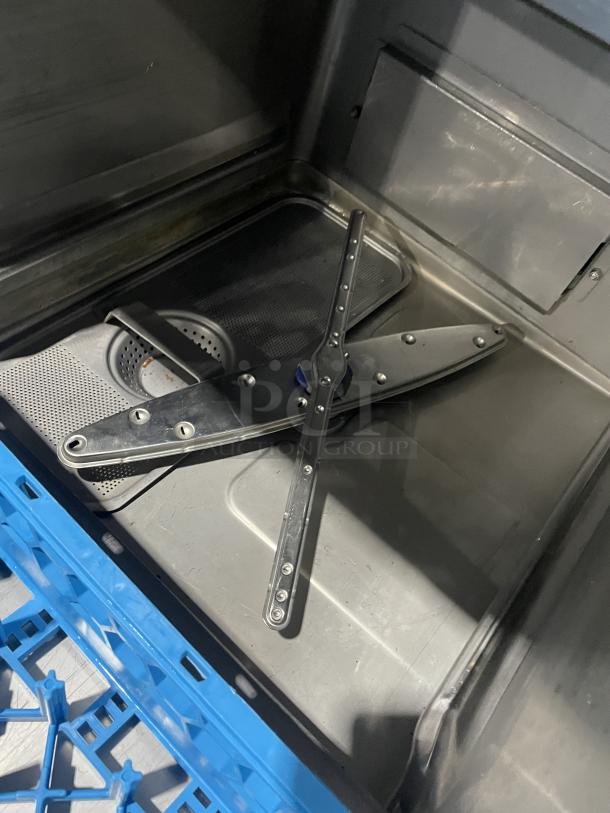 Hobart Advansys LXe undercounter dishwasher interior showing spray arms, stainless steel finish, and Energy Star label.