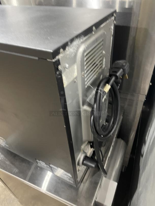 2022 Merry Chef Eikon E2S countertop rapid cook oven, 208-240V, used condition, back view showing power cord and labels.