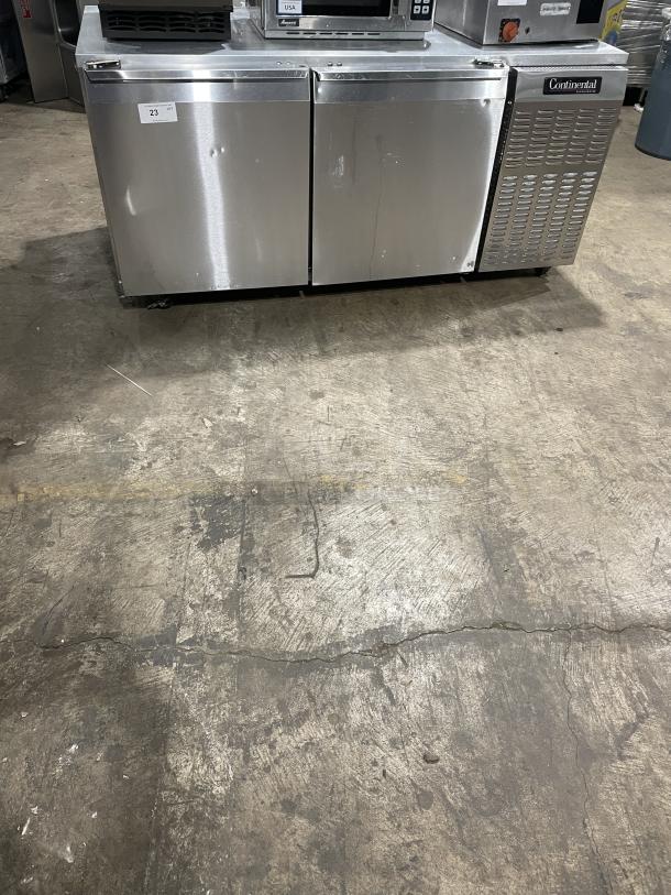 Continental CURB67 stainless steel 2-door lowboy cooler, electric-powered, on casters, model SN:15052129, 115V, 1 phase.