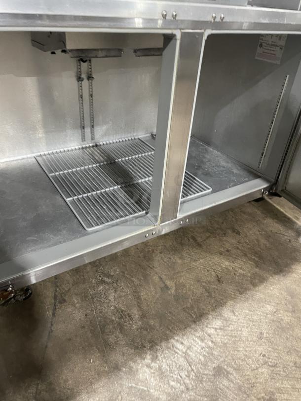 Continental CURB67 commercial stainless steel 2-door refrigerated lowboy cooler, electric, on casters, Model SN:15052129.