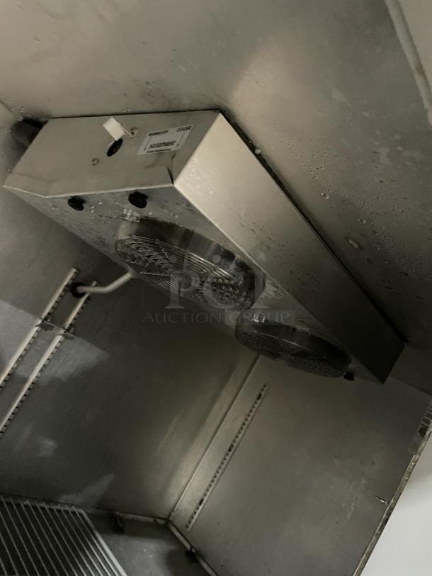 Continental CURB67 stainless steel 2-door refrigerated lowboy cooler interior. Features electric power, casters, and is model 115V 1-Phase.