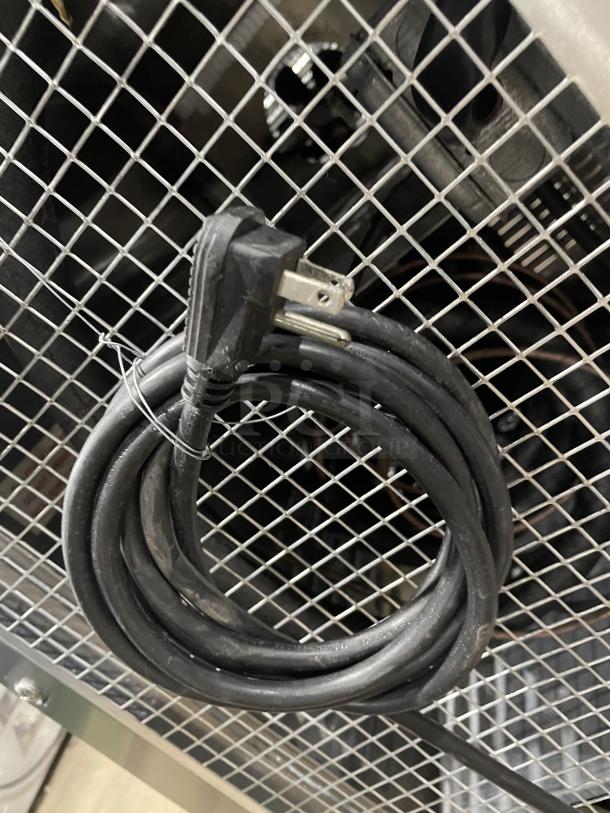 Coiled power cord for Continental CURB67 lowboy cooler, model 115V, 1 Phase, on casters, SN:15052129, detail view.
