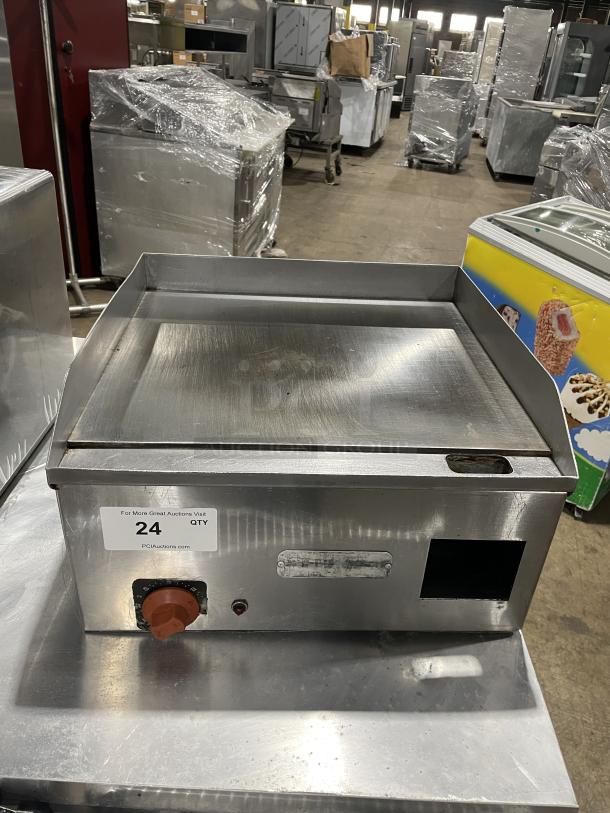 Croydon stainless steel electric griddle, model OR4E100001W5. Features back & side splash, 110V, with dial and indicator light.