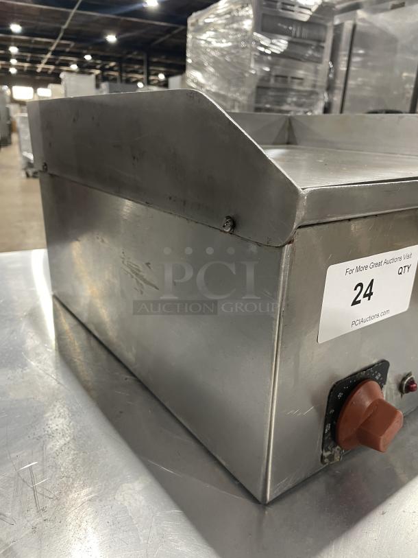 Croydon stainless steel electric griddle, model OR4E-100001W5, with back and side splash. Features visible dial.