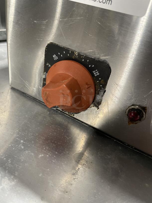 Croydon OR4E-100001W5 griddle, stainless steel, orange knob with temperature markings, 110V, used condition.