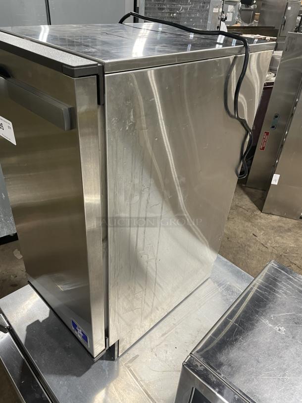 Manitowoc SMS050A002 stainless steel ice maker, air-cooled, undercounter, 115V, minor wear visible, SN: 310478076.