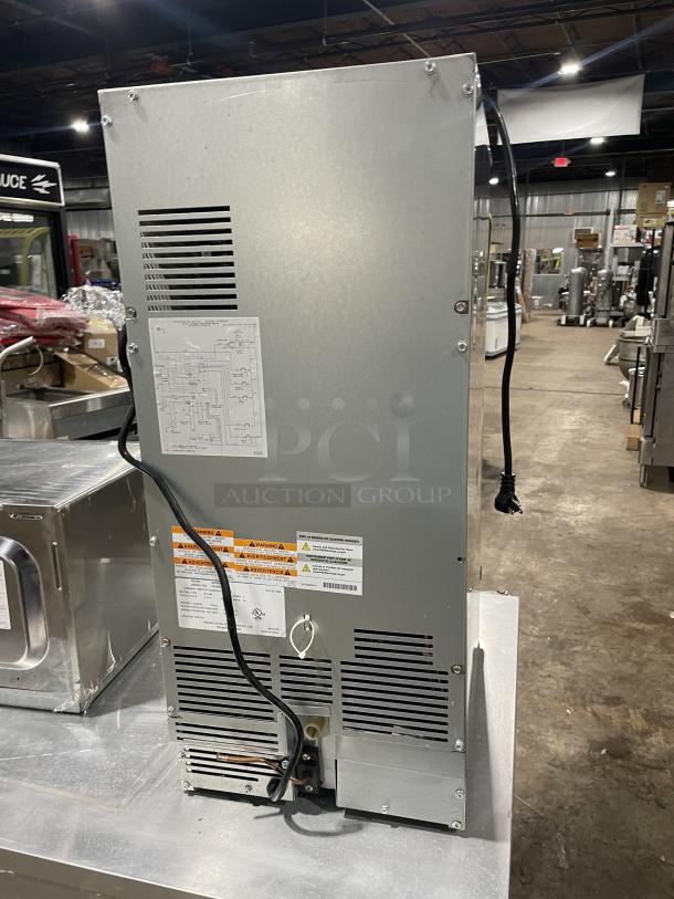 Manitowoc SMS050A002 ice machine, stainless steel, air-cooled, undercounter, 115V 1 Phase, indoor/outdoor, excellent condition.