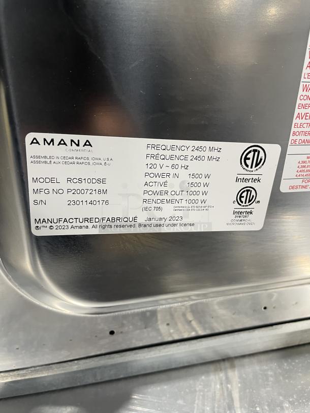 Amana commercial stainless steel countertop microwave, model RCS10DSE, 2023, electric, 120V, 1000W output, serial 2301140176.