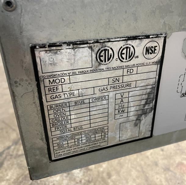 Asber commercial stainless steel natural gas fryer, includes backsplash, basket hanger, fry basket, and casters. ETL and NSF certified.