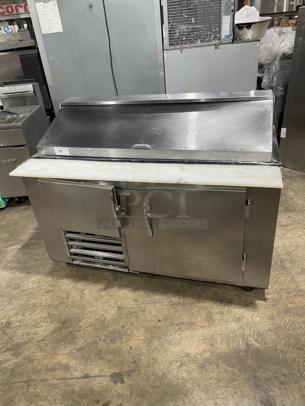 Commercial stainless steel 2-door refrigerated bain marie salad/sandwich prep table with cutting board and poly-coated rack, on casters.