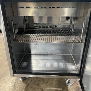 Turbo Air TST-28SD refrigerated prep table with cutting board, stainless steel, single door, on casters, 115V.