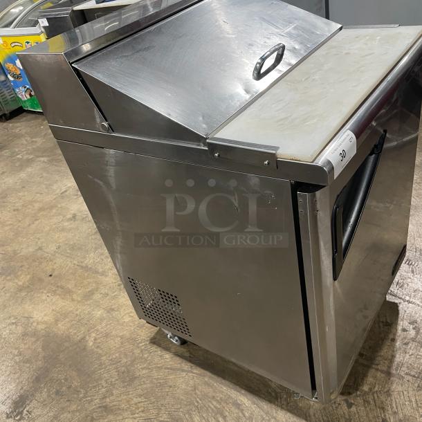 Turbo Air TST-28SD stainless steel prep table, single door, cutting board, 115V, on casters, good condition.