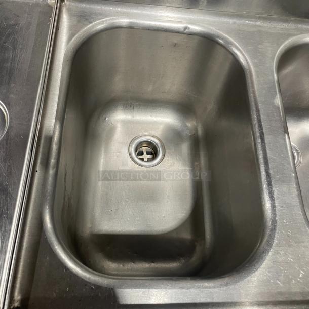 Eagle Group Spec-Bar 2000 commercial stainless steel 3-compartment underbar sink, model B53LR19, with side drain boards and backsplash.