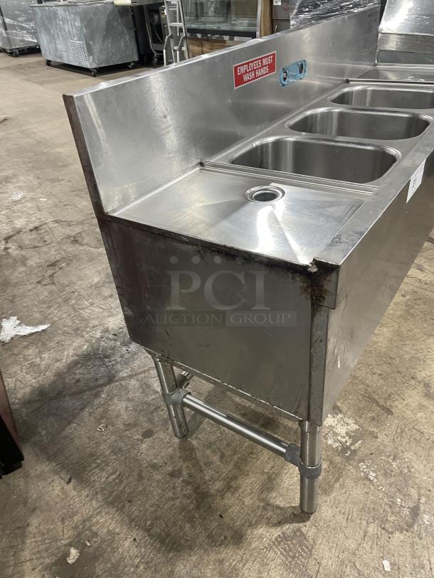 Eagle Group Spec-Bar 2000 Series 60" 3-compartment stainless steel underbar sink with side drain boards, backsplash, and legs.
