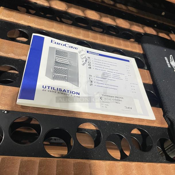 EuroCave Vieillitheque Confort Series V264W wine cooler manual on wooden shelves, Model SN: 71434, 115V, 60Hz.