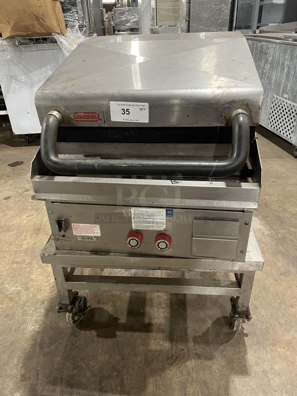 Lang stainless steel natural gas infrared clamshell griddle, model 224TH-NATMG, on equipment stand with casters.