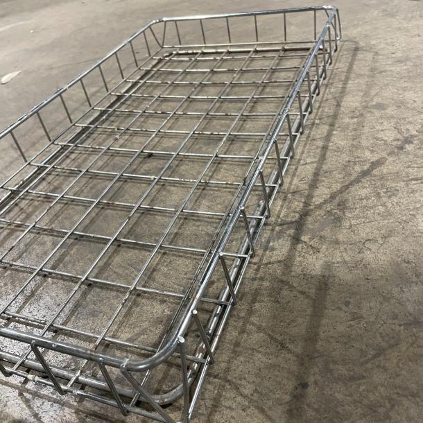 Commercial stainless steel bagel/bread display basket, wire construction, excellent condition, ideal for retail use.