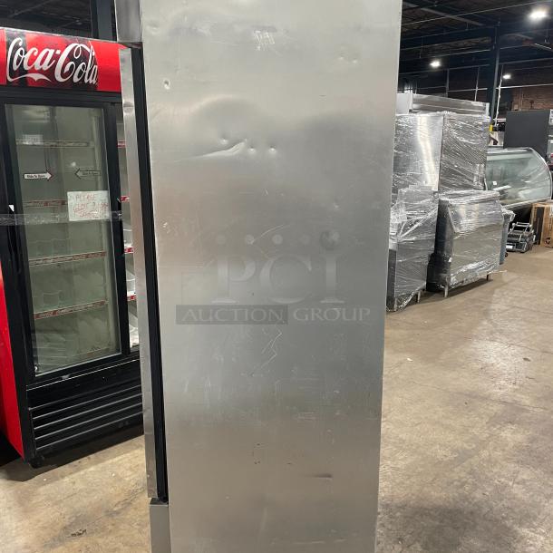 True T-23F stainless steel one-door reach-in freezer on casters. Commercial grade, model T-23F, SN 7887234, 115V 1 Phase.