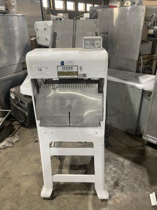 Oliver Model 797-32-NC commercial bread slicer, white, electric, gravity feed, stainless steel worktop, on casters, 115V, 1 phase.