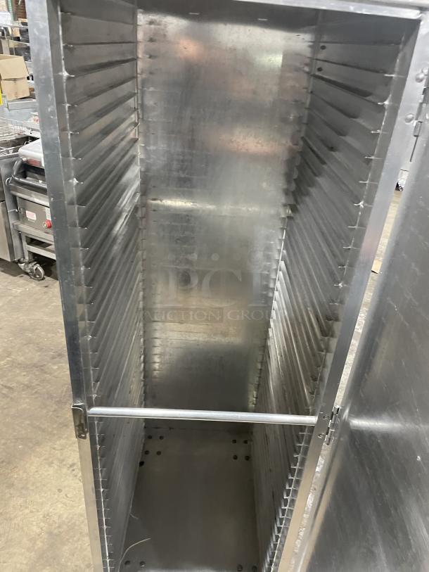 Cres Cor aluminum enclosed full-size sheet pan cabinet on casters, visible slots for pans, good condition.