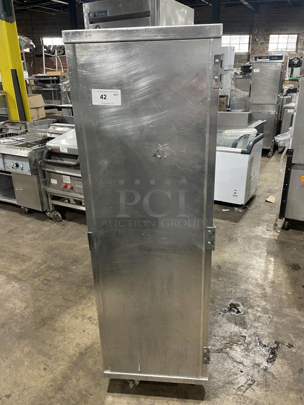 Cres Cor aluminum full-sized sheet pan cabinet on casters. Used condition with visible wear. Number label "42" on front.