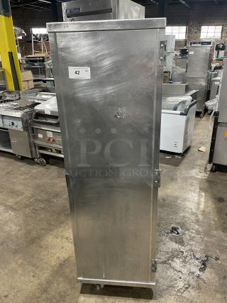 Cres Cor aluminum full-sized sheet pan cabinet on casters. Used condition with visible wear. Number label "42" on front.