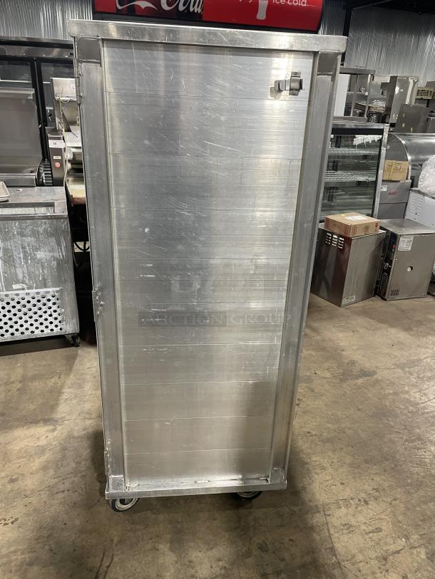 Cres Cor aluminum enclosed full-sized sheet pan cabinet on casters, used condition, durable construction for food storage.