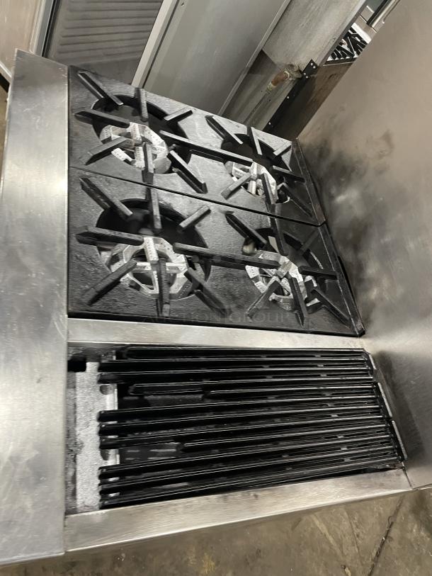Jade Range gas-powered 4-burner and char broiler combo with full-sized oven. Commercial casters included. Good condition.